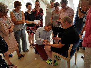 John Boel jr trains Acunova acupuncture to students